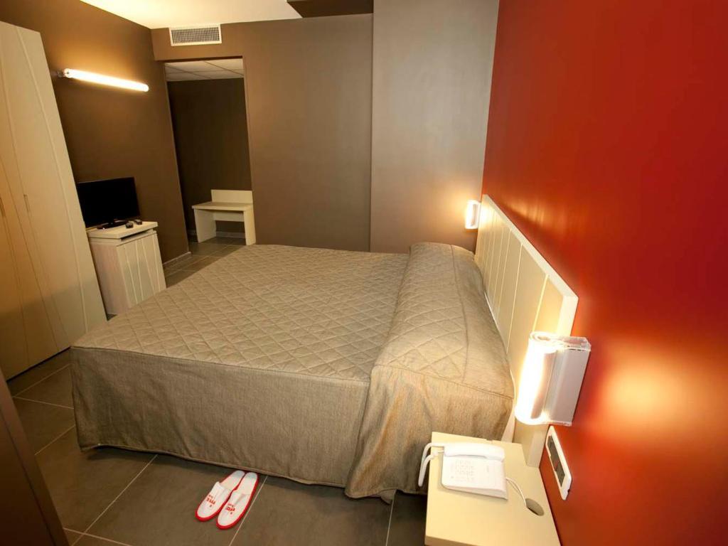 Rolling Hotel Casoria Quarto foto